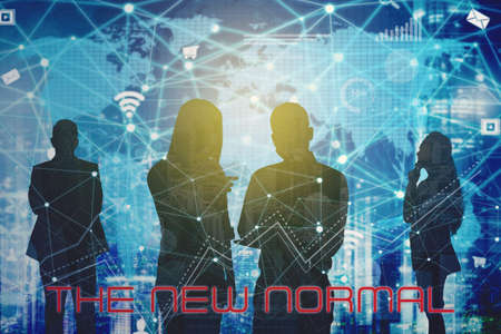 Silhouette of business people with new normal text in double exposure of blurred city and network...