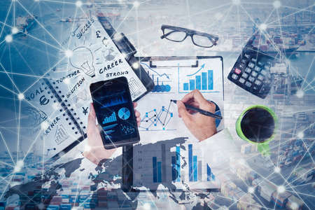 Double exposure of businessman hands working with mobile phone and clipboard while analyzing growth...