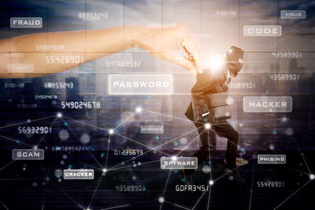 Double exposure of male hacker carrying a laptop while arrested by big hand on code binary...