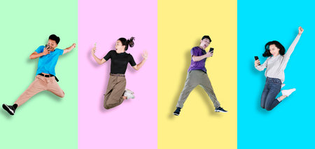Collage of four teenagers looks excited while using a mobile phone and jumping together with...