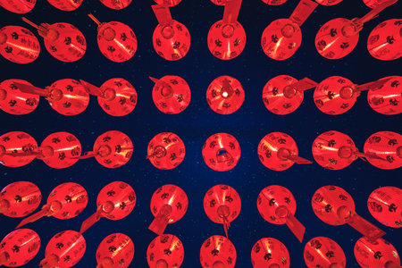 Low angle view of rows of red lanterns hanging in the temple for Chinese new years celebrationの写真素材