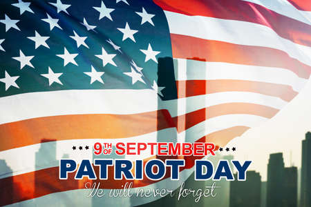 Double exposure of USA flag blowing in the wind with Patriot day text to remembrance victims of 911...