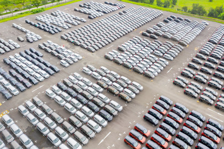 Aerial view of colorful new car lined up in the factory for export and import in Karawang, Indonesiaの写真素材
