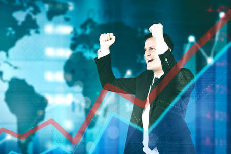 Double exposure of male manager expressing success while standing with upward arrow and world exchange rate backgroundの写真素材