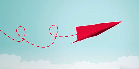Think differently concept: Red plane paper flying with dotted lines in the blue sky. Shot at...