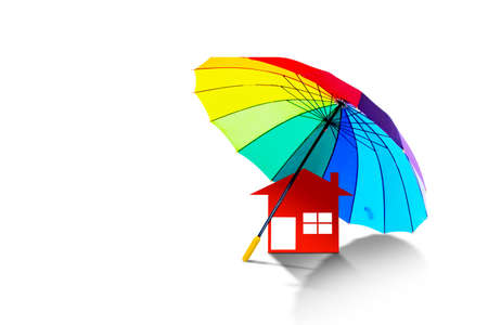 Close up of colorful umbrella with a red house in the studio. Isolated on white backgroundの写真素材