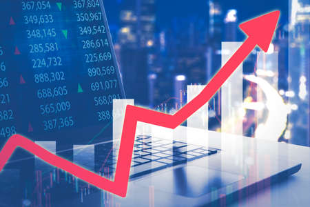 Double exposure of laptop screen displaying stock market with upward arrow background