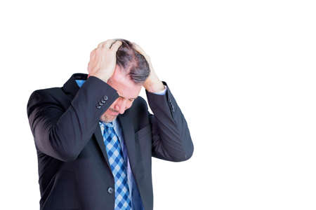 Male manager holding his head while feeling stressed in the studio. Isolated on white background