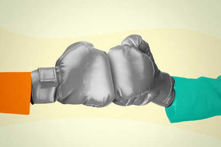 Two clashing boxing gloves collage in magazine style. Contemporary art. Modern designの写真素材