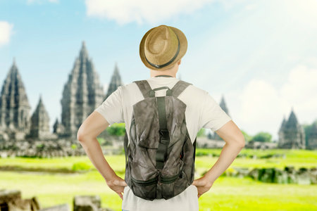 Young Traveler Exploring Ancient Temple â Cultural Heritage and Adventureの写真素材