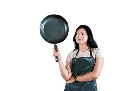 Female Chef Posing with a Frying Panの写真素材
