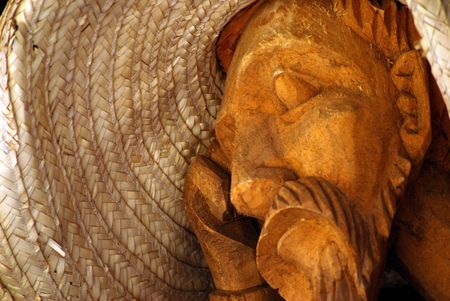  Sleeping Man made of wood with a Hatの写真素材