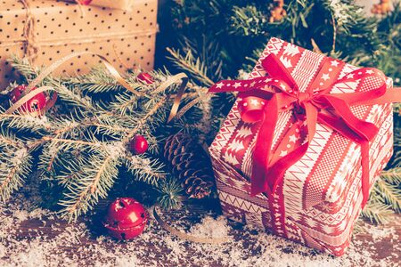 Christmas tree New Years toys gifts on a wooden dark background. Flat layout greeting card template with copy space.の写真素材