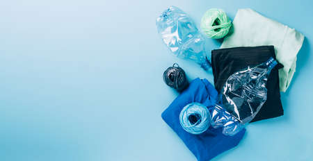 Polyester fiber synthetic fabrics eco-friendly textile recycled recyclable plastic bottles. Reuse...