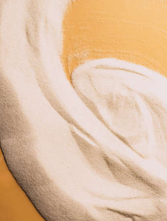 Natural white sand background for product presentation. Abstract sand texture. Top view copy spaceの写真素材