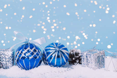 Christmas blue balls toys shiny festive background Greeting card with winter holidays Merry Christmas or Happy New Yearの写真素材