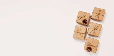 Festive background mockup for Christmas or New Year copy space. Gifts in paper eco-friendly packaging white backgroundの写真素材