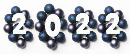 New year 2022 numbers on blue holiday balloons. White background. Copy space , new 2022 offensive...
