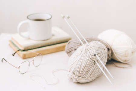 Threads for knitting, from natural environmentally friendly wool, close-up on a light background....