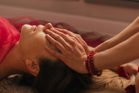 A woman reiki master works with patient, is engaged energy practice, concept mental health harmonyの写真素材