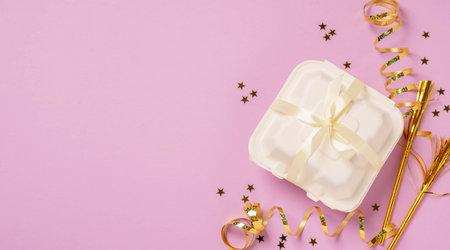 Bento cake pink background. little dessert cake for gift. Korean style cakes in box for one personの写真素材