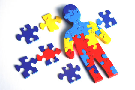 The figure of man is composed puzzle pieces o blue yellow red flowers. Health autism awareness day,. Illustration, Generative AIの写真素材