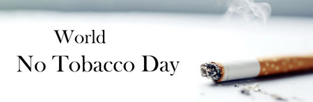 Smoking cigarette, cigarette burning and tobacco smoke, light background inscription World No Tobacco Day. copy space.の写真素材