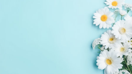 Cute bouquet of gerbera chamomile, blue background. Festive composition for Doctors Nurses Day, Moms Day, Familys Dayの素材