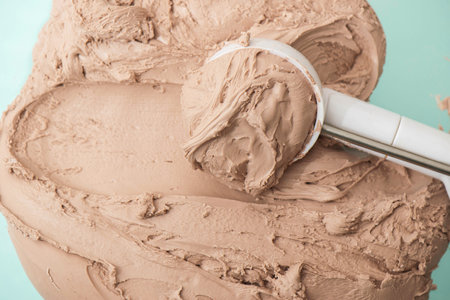 Chocolate ice cream, texture. Delicious ice cream texture background. Summer cooling dessertsの写真素材