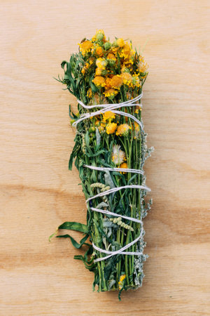 A bunch of herbs, a twist for aromatherapy and fumigation at home. Magic, shamanism, herbalism. Non-traditional methodsの写真素材