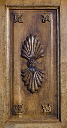 Carved wood panel with floral ornamentsの写真素材