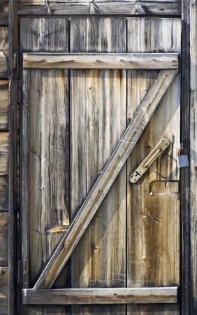 Door made of discoloured pine timberの写真素材
