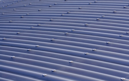 Blue corrugated metal sheet roof for backgroundの写真素材