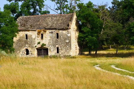 Ruined old country house with broken windows
の写真素材