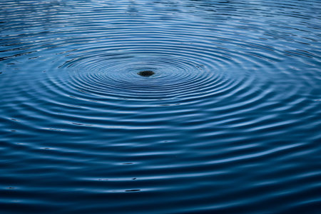 Water ripples and ripples on blue water. Abstract background.の素材
