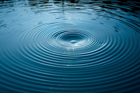 abstract background of water ripples and ripples in blue colorの素材