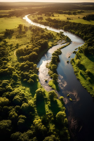 Aerial view of the river and forest at sunset. Nature composition.の素材