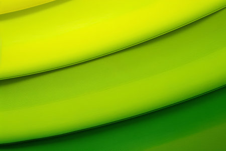 abstract background of green and yellow wavy lines. close upの素材