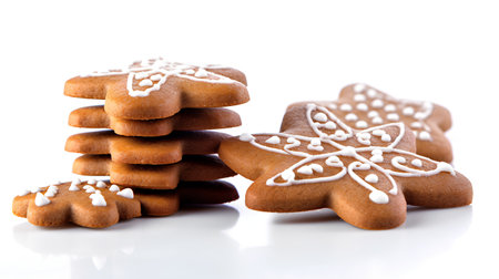 Christmas gingerbread cookies isolated on white background, selective focus, shallow DOF.の素材