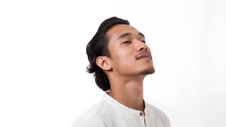 Portrait of a handsome asian man isolated on white background.の素材