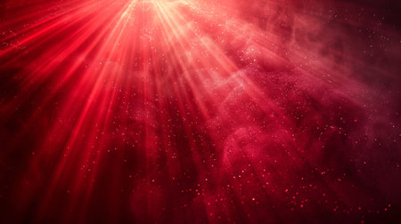 abstract red background with rays of light and bokeh effectの素材