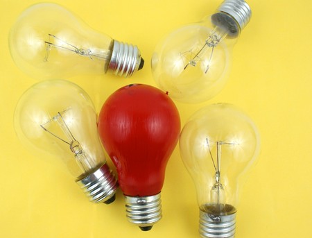 some light bulbs on yellow backgroundの写真素材
