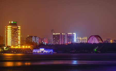 At the riverside and night time at the Yantze River of Wuhan City of China. is special name. Lighting in many building in there.のeditorial素材