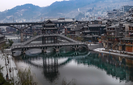 FENGHUANG, HUNAN, CHINA - JANUARY 25,2018: Unidentified tourists at The Old Town of Phoenix (Fenghuang is Specific name). The popular tourist attraction which is located in Fenghuang County, のeditorial素材