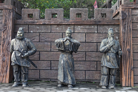 CHIBI, HUBEI/ CHINA - OCT 25 2018: Statues of Guan Yu, Liu Bei and Zhang Fei (Oath of the Peach Garden) in Peach garden. At the Three kingdom Chibi Battle field. Chibi, Chinaのeditorial素材