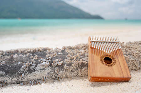 Kalimba or mbira is an African musical instrument. Kalimba made from wooden board with metal, play on hands and plucking the tines with the thumbs. Itâs tradition Zimbabwe music instrument.の写真素材