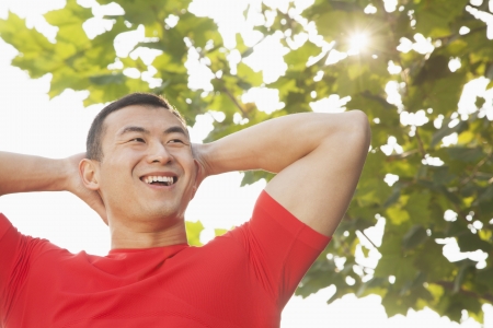 Young Muscular Man Stretchingの写真素材