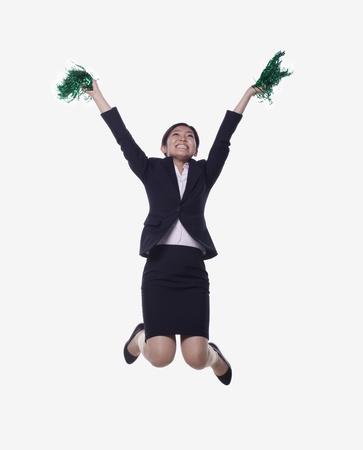 Businesswoman Jumping and Cheeringの写真素材