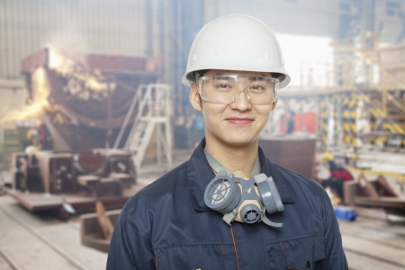 Construction worker on site, portraitの写真素材