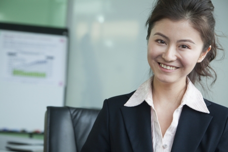 Businesswoman in meeting room portraitの写真素材